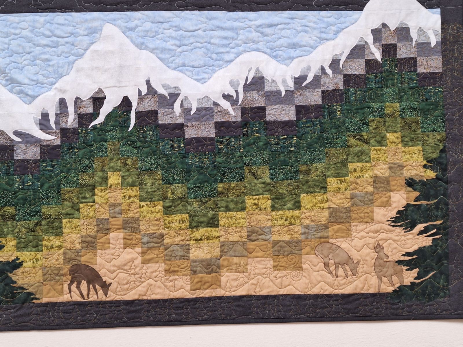 Bargello Wall Hanging with Deer and Mountains by Michele Urbany Neely Puluti, featuring snow-covered peaks, evergreen forest, meadow, and two deer